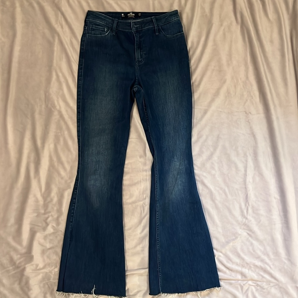 Hollister hi rise flare, soft stretch jeans with cute bottom side slit